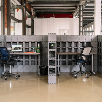 Two Cubik desks with a shared partition