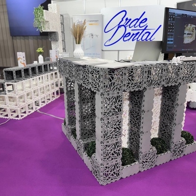Reception desk with a branded backdrop