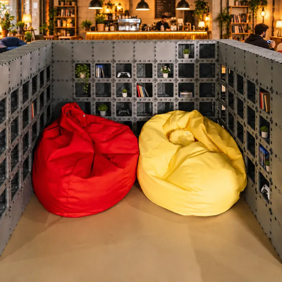 Red and yellow beanbags inside a Cubik chill-out nook